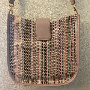 NWT Lori Goldstein purse in original package. All leather material. Sparkly!